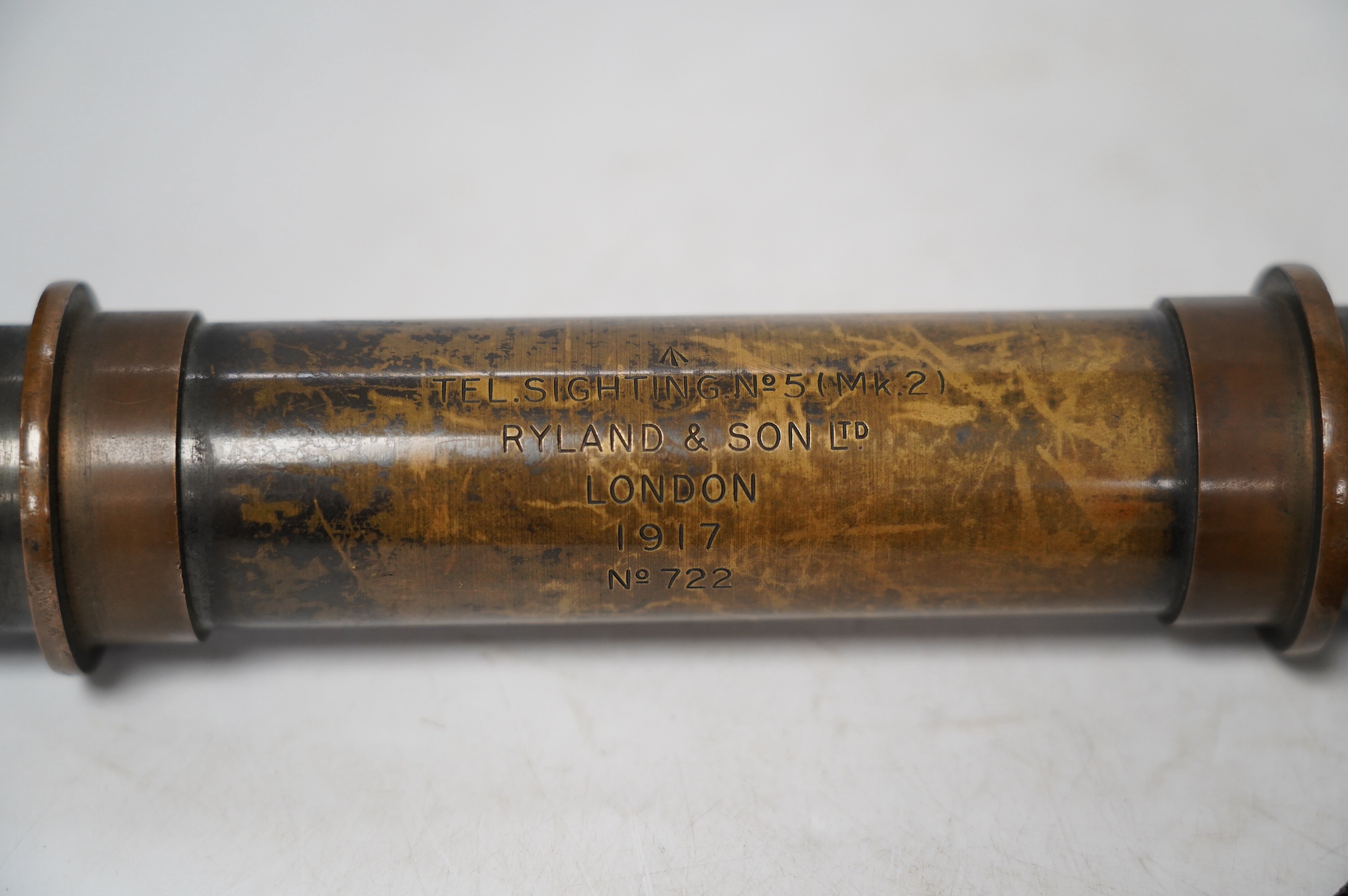 A First World War military brass gunners sight, stamped with board arrow and; ‘TEL. SIGHTING. No.5 (Mk.2) Ryland & Son Ltd. London 1917 No.722’, 54cm long, together with outer canvas case